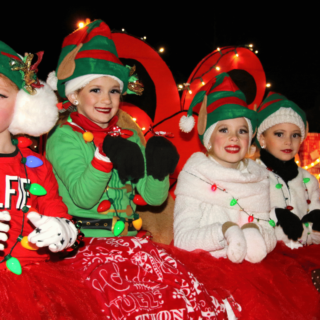 Young girls dressed as elves